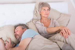 woman angry at husband for snoring