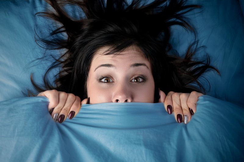 woman has nightmare needs to visit sleep apnea dentist