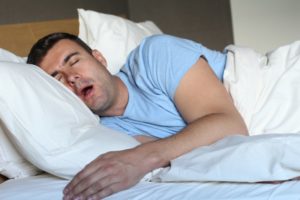 man sleeping with mouth open